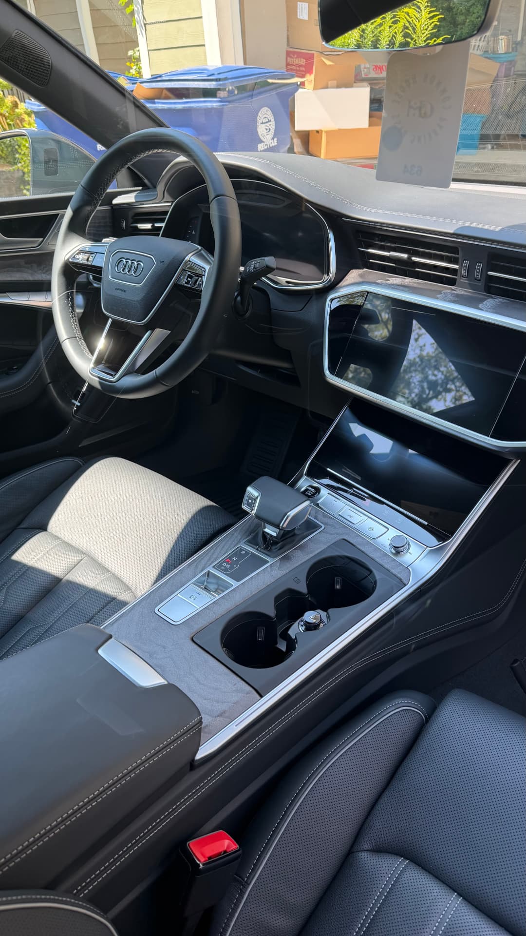 Audi A7 dashboard, steering wheel, and center console freshly detailed