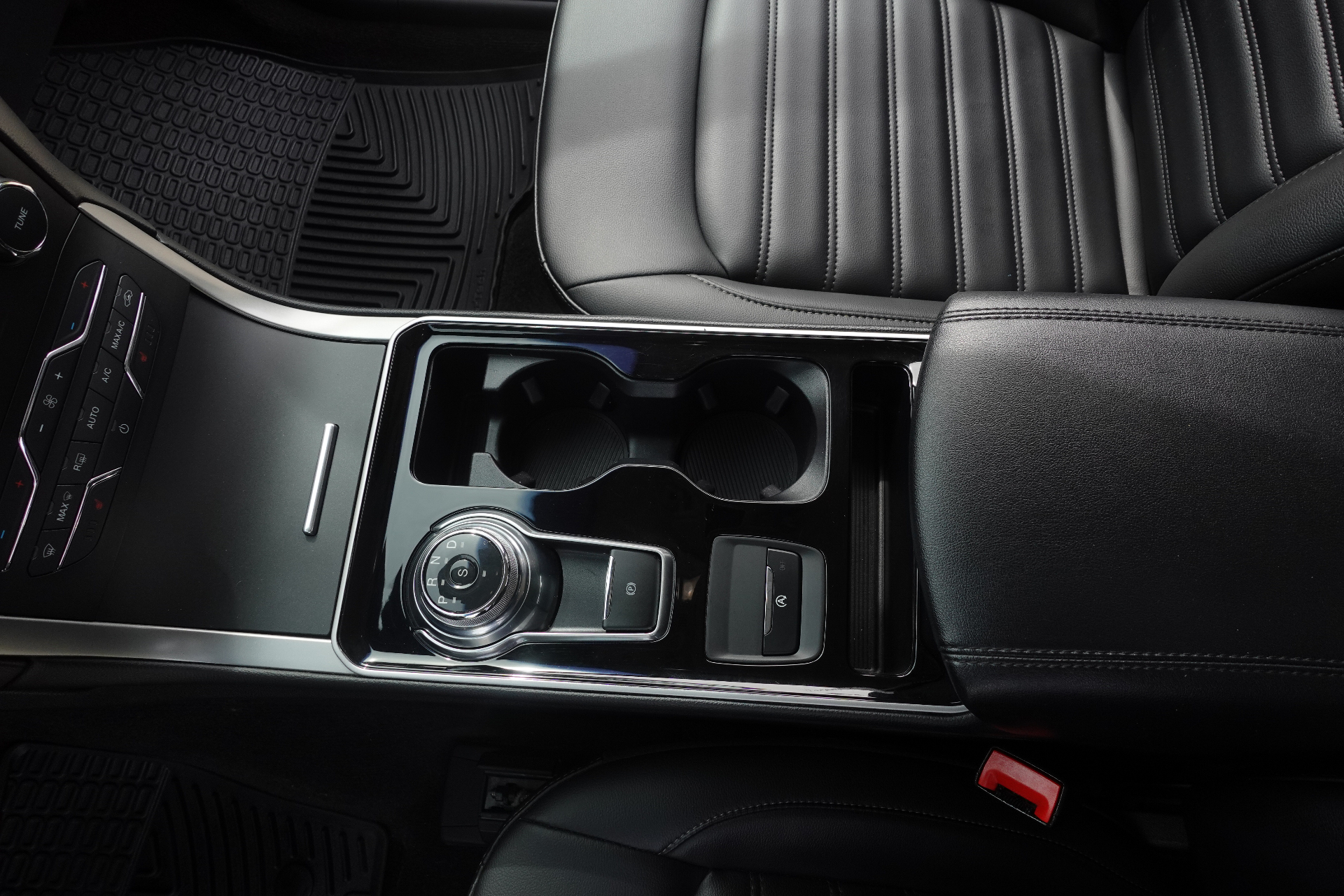 Ford Edge center console, cup holders, and shifter spotless after an interior detail